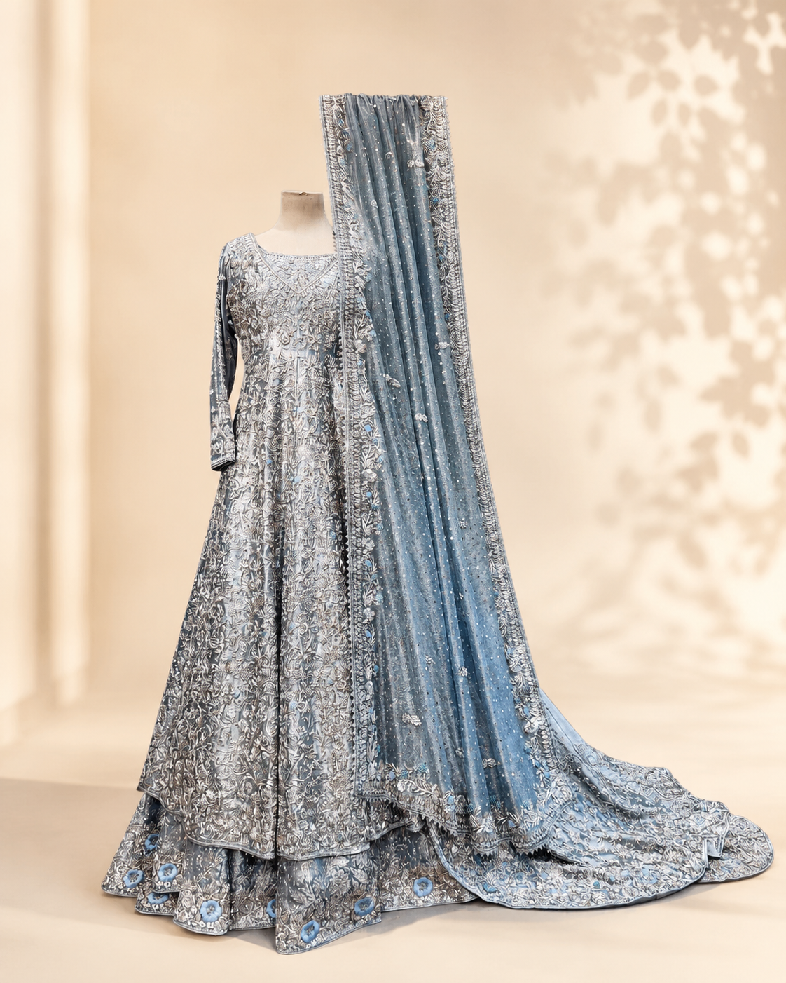 Sapphire bridal anarkali shown from the side with the embellished dupatta draped and trailing, over the layered lehenga