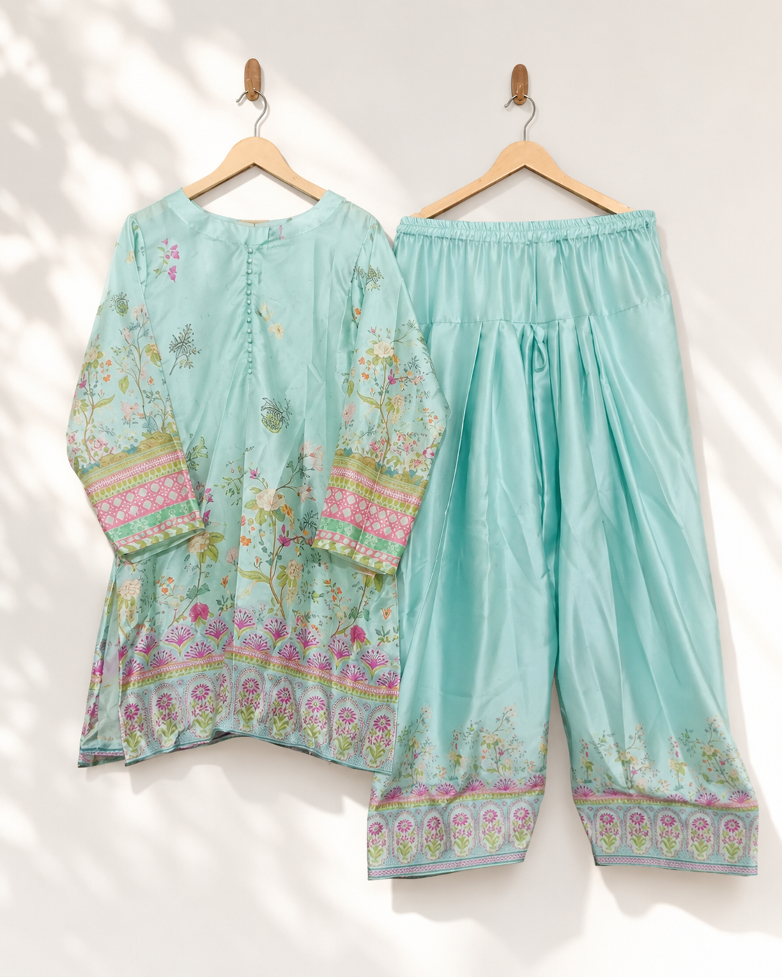 Aqua Blossom two-piece suit — aqua floral printed kurta with lattice cuff bands and matching wide-leg trousers