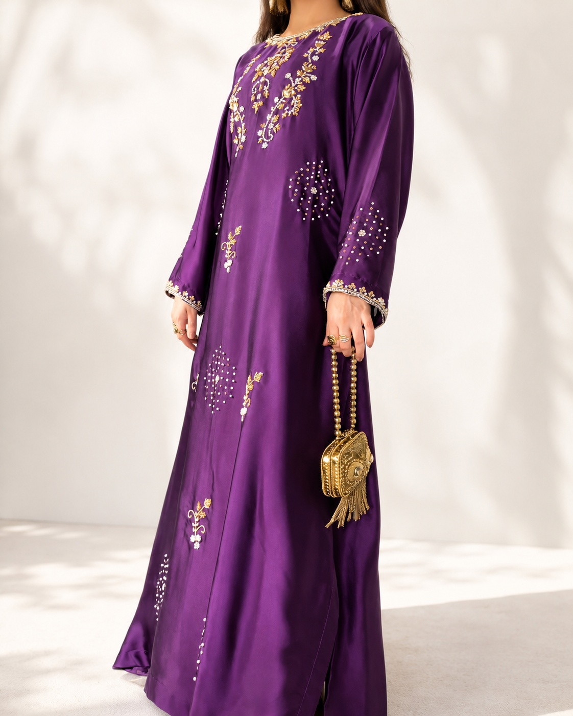 Zarina purple embellished maxi dress — three-quarter view with gold clutch