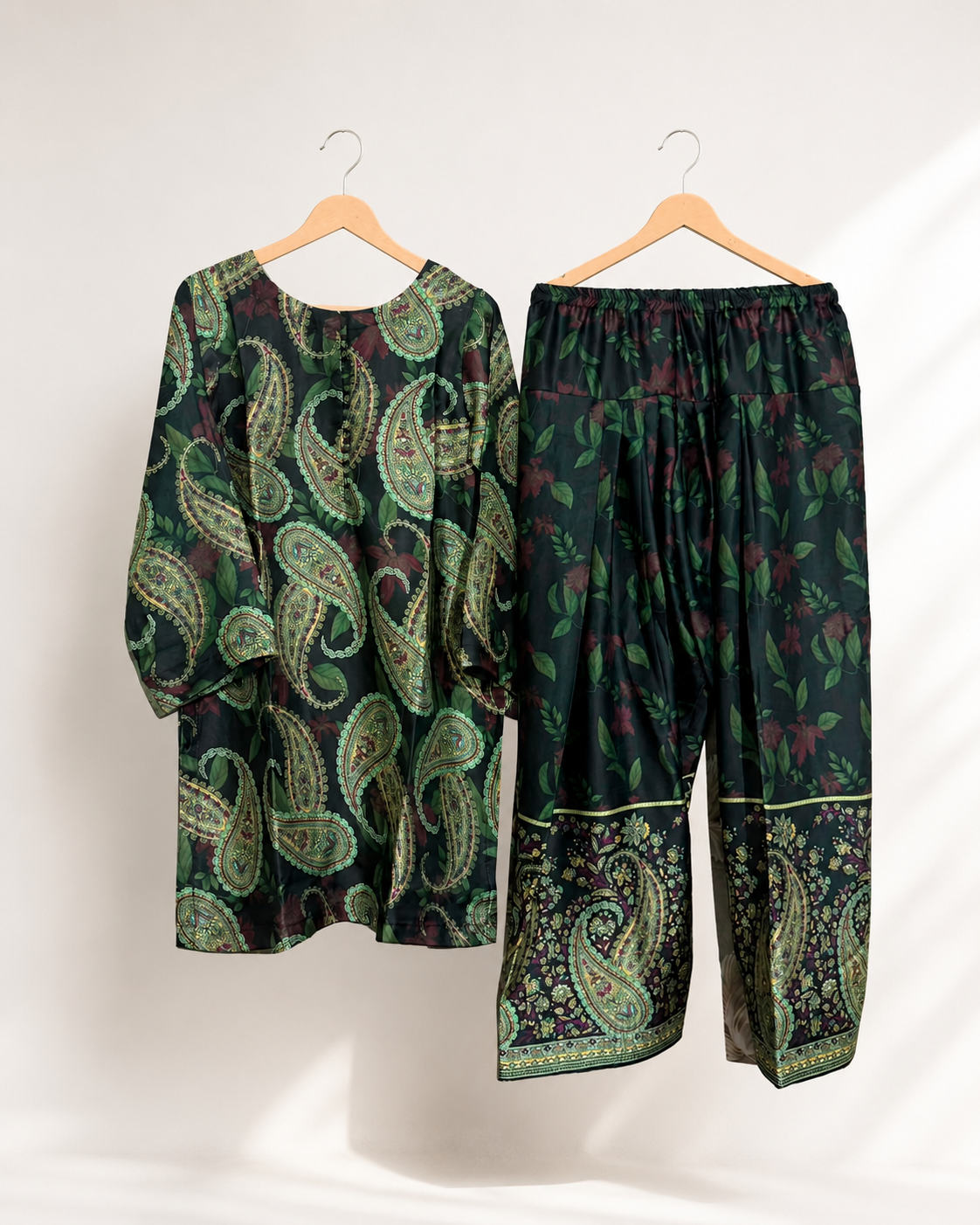 Jade Paisley two-piece suit — deep green kurta with jade and gold paisley print and botanical wide-leg trousers with paisley hem border