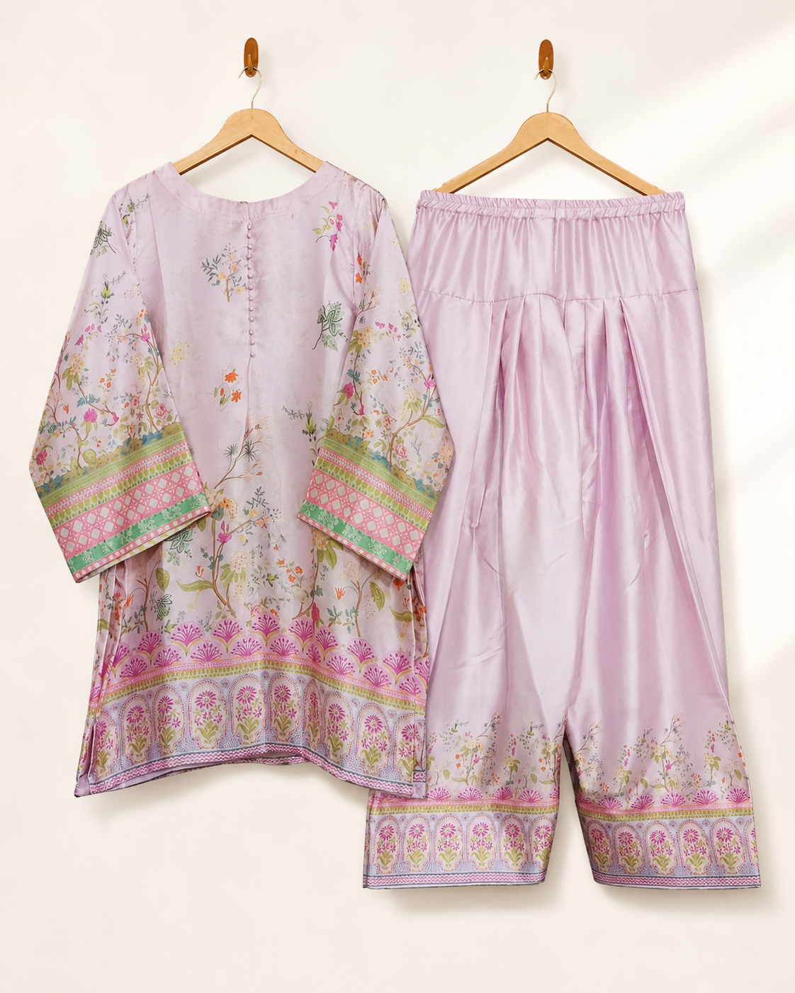 Lilac Blossom two-piece suit — lilac floral printed kurta with lattice cuff bands and matching wide-leg trousers