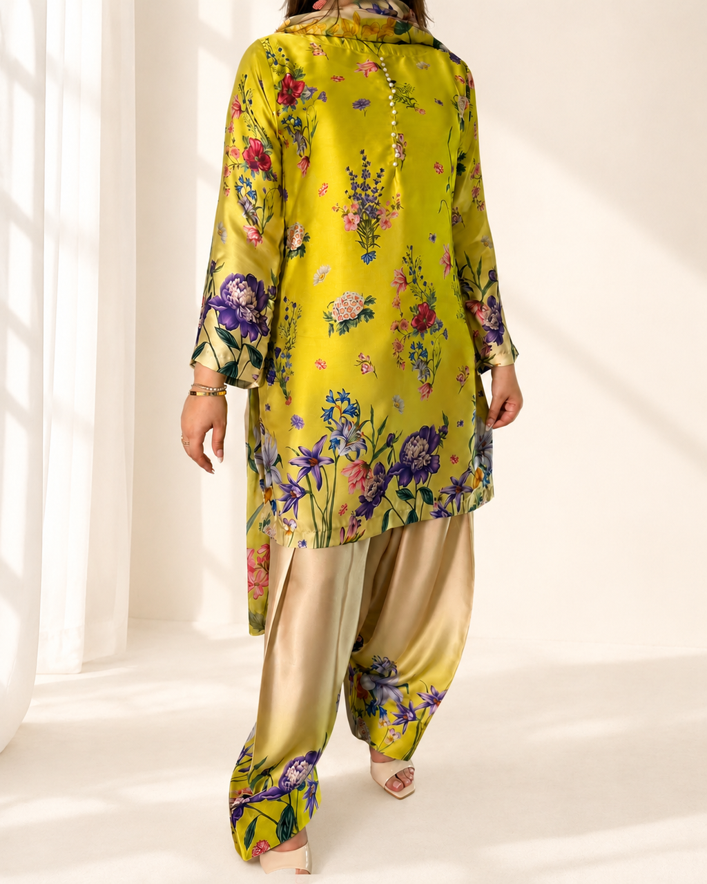 Back view of the lime floral printed three-piece suit